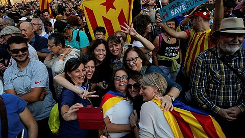 Catalan lawmakers burst into song after independence declaration