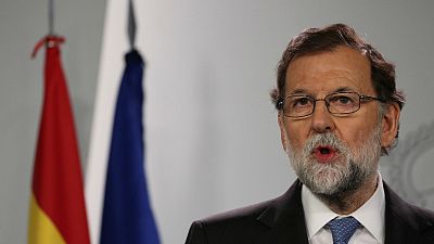 Spanish PM Rajoy fires government of Catalonia, calls snap elections