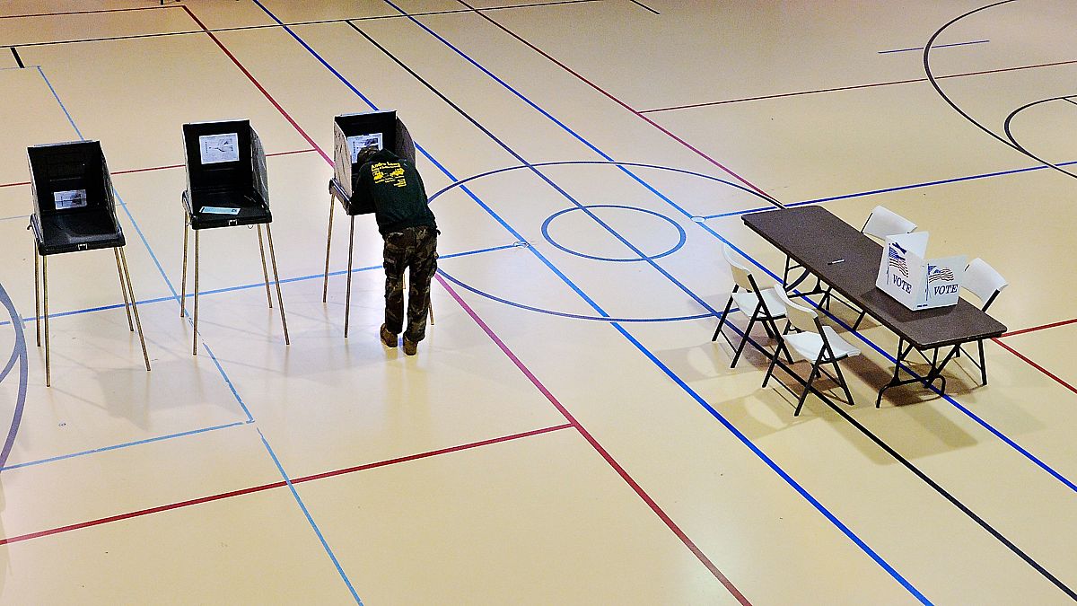 Image: A man votes in Durham, North Carolina