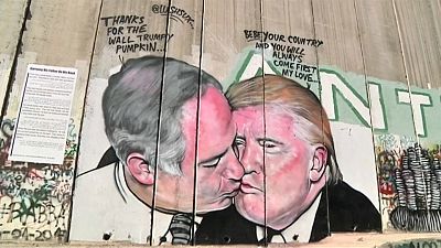 Trump Netanyahu kiss mural appears in the West Bank