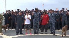 Finally, dry land: rescued sailors come ashore after five-month ordeal