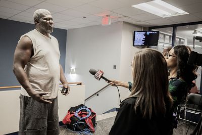 Tyree Bonds speaks with members of the press outside a crowded city council meeting on Monday night in South Bend, Indiana. Mr. Bonds is Eric Jack Logan\'s brother.