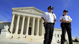 U.S. Supreme Court Police Department officers stand in front of the Supreme