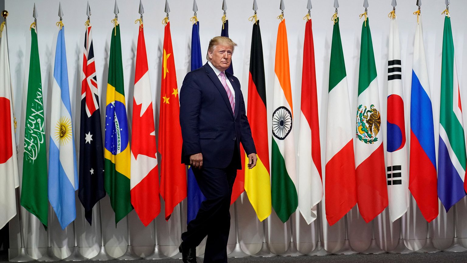 Image: President Donald Trump arrives at the G20 leaders summit in Osaka, J