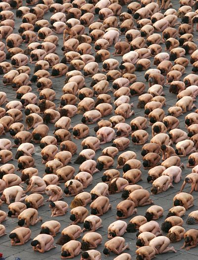 Thousands of people pose in the nude for an installation by photographer Spencer Tunick, on May 6, 2007 at the Zocalo square in Mexico City.