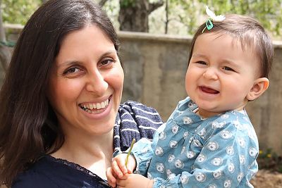 Nazanin Zaghari-Ratcliffe posing for a photograph with her daughter Gabriella.
