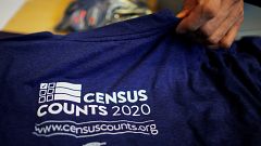 Image: T-shirts are displayed at a community activists and local government