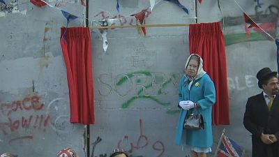 Banksy hosts Bethlehem street party to mark Balfour Declaration centenary