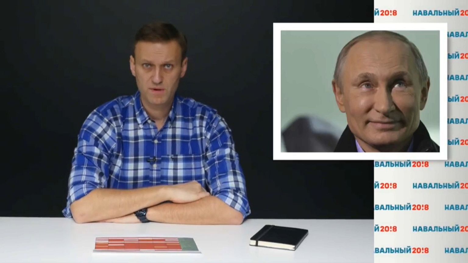 Navalny says he will sue Putin