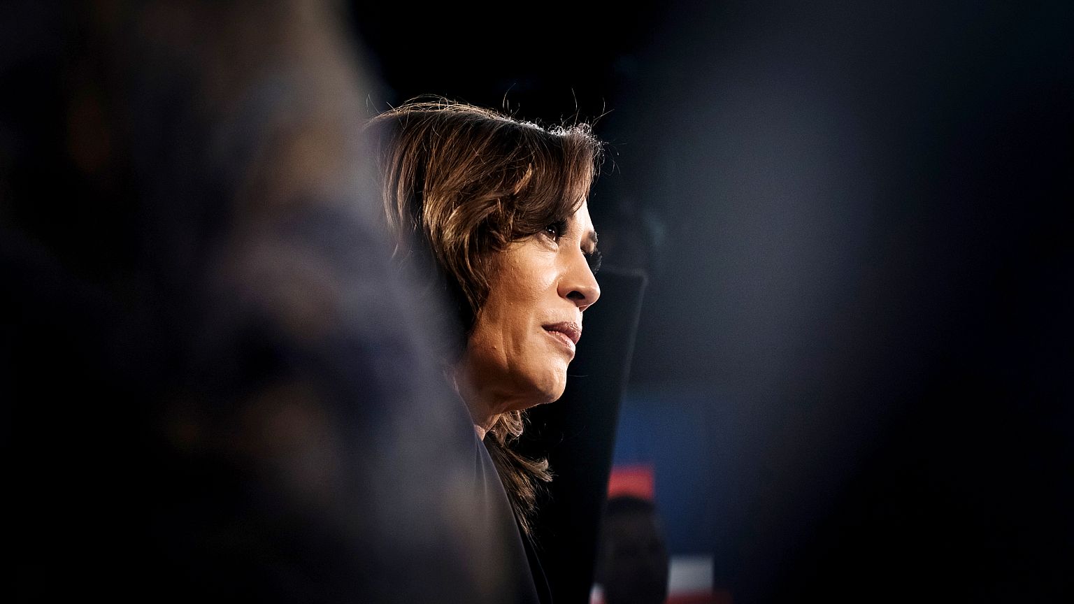 Image: Sen. Kamala Harris speaks to the media following the first Democrati