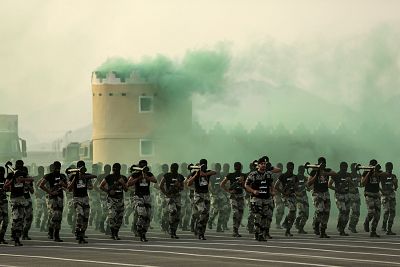 Saudi security forces take part in a military parade near Mecca on Sept. 17, 2015.