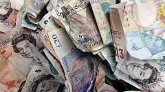 The Bank of England raises its interest rate to 0.5 pct from 0.25 pct, the first hike in 10 years