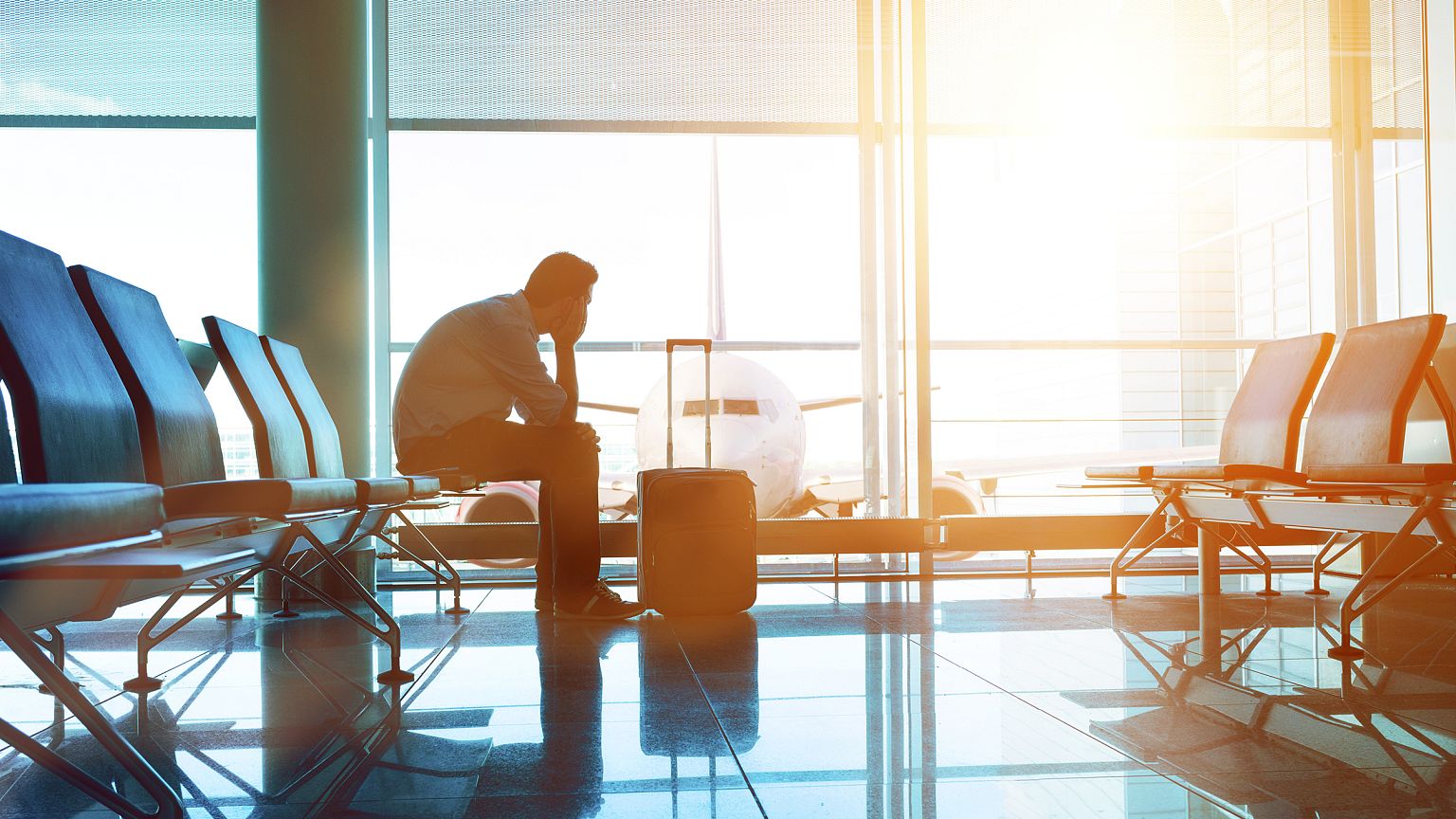 Image: Passenger waits for plane in an airport