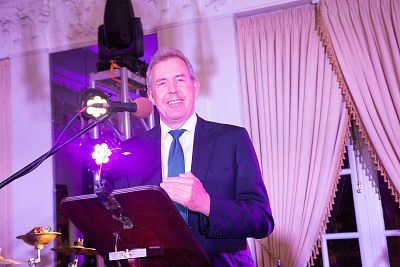 Kim Darroch presents an award at the White House Correspondents\' Dinner pre-party at the British Embassy on April 27, 2018.