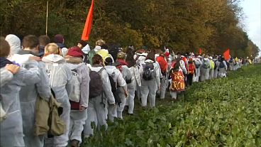 Activists enter the grounds of a brown coal mine near Bonn