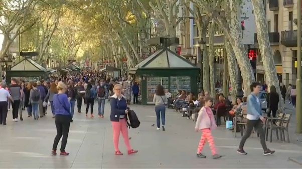 Apoyo a Puigdemont y cautela en las calles de Barcelona Apoyo a Puigdemont y cautela en las calles de Barcelona