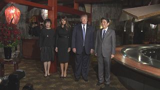 Trump and Abe talk trade and golf tactics at start of Asian tour