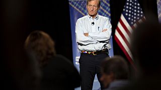 Image: Tom Steyer listens during a town hall event in Ankeny, Iowa, on Jan.