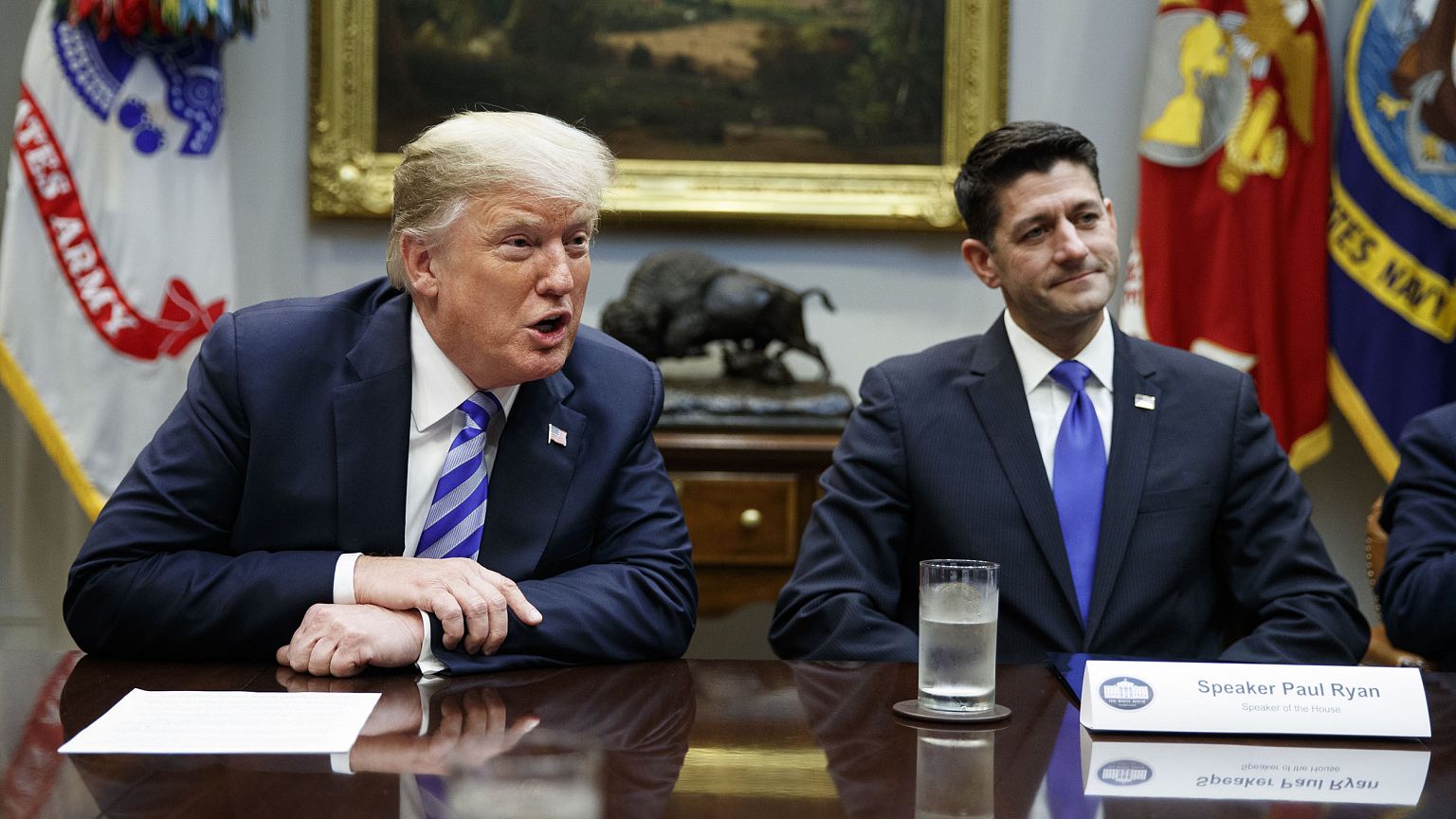 Image: Speaker of the House Rep. Paul Ryan, R-Wis., listens to President Do