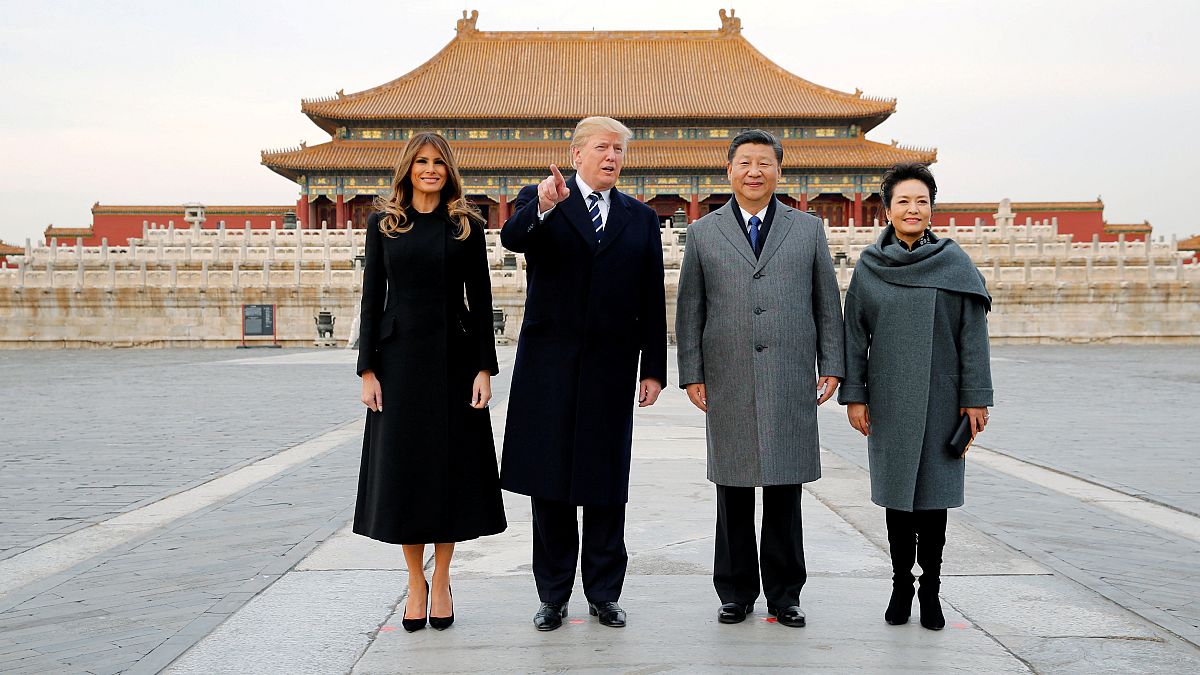 Trump lands in Beijing with get tough message over North Korea
