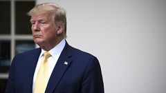 Image: President Donald Trump listens as Attorney General William Barr spea