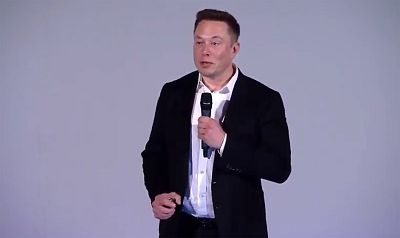 Elon musk speaks at a Neuralink Livestream event Tuesday night at the the California Academy of Sciences in San Francisco.