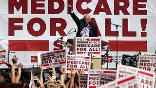 Image: Sanders speaks during a health care rally