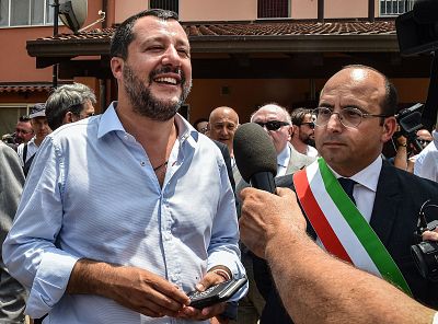 Italian Interior Minister Matteo Salvini, left, with the mayor of Mineo, Giuseppe Mistretta, during the closure an asylum seeker and migrants reception center.