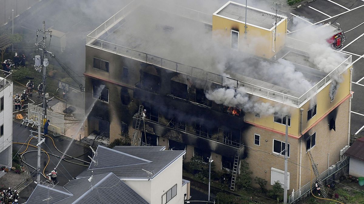 Image: An aerial view shows firefighters battling fires at the site where a