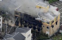 Image: An aerial view shows firefighters battling fires at the site where a