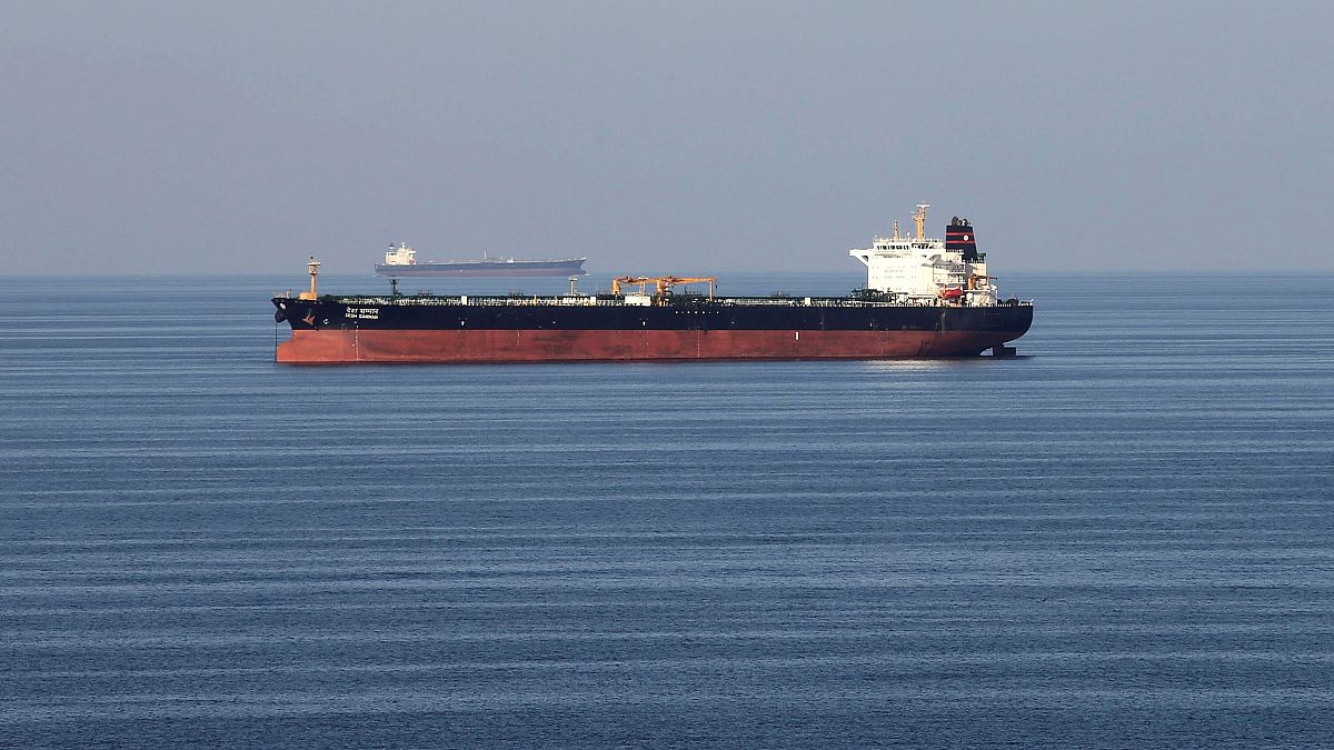 Image: Oil tankers pass through the Strait of Hormuz.