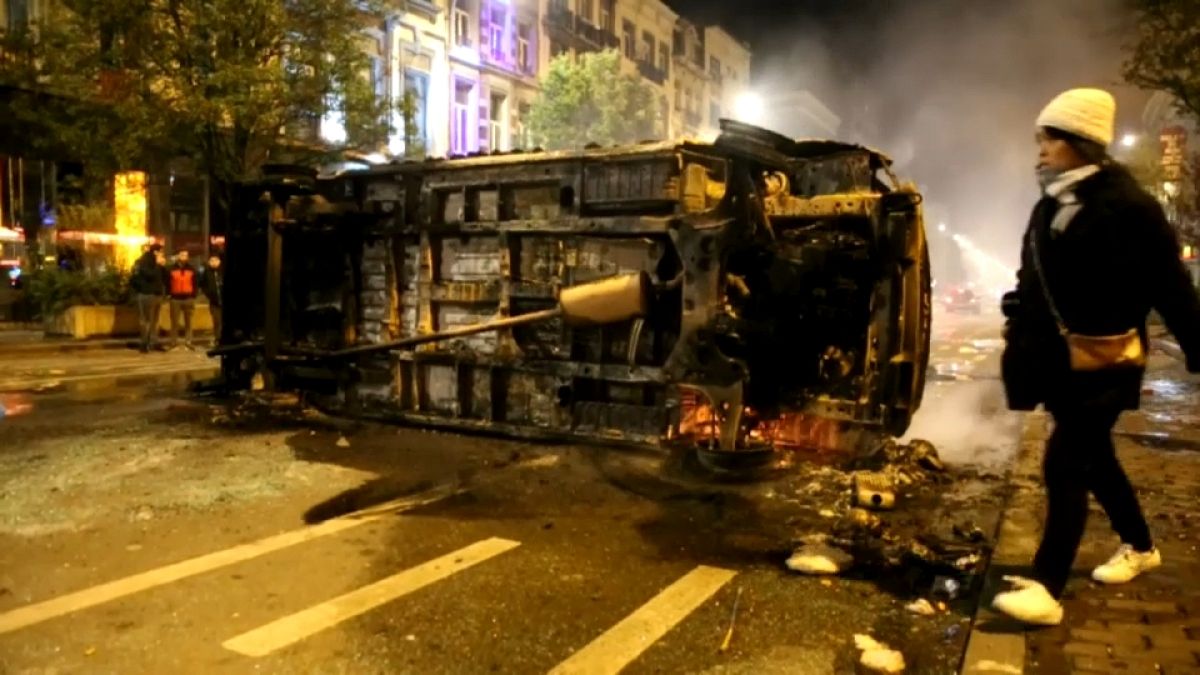Moroccan football fans riot in Brussels after country's World Cup qualification