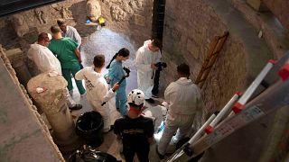 Image: Experts open the ossuary at the Teutonic Cemetery at the Vatican
