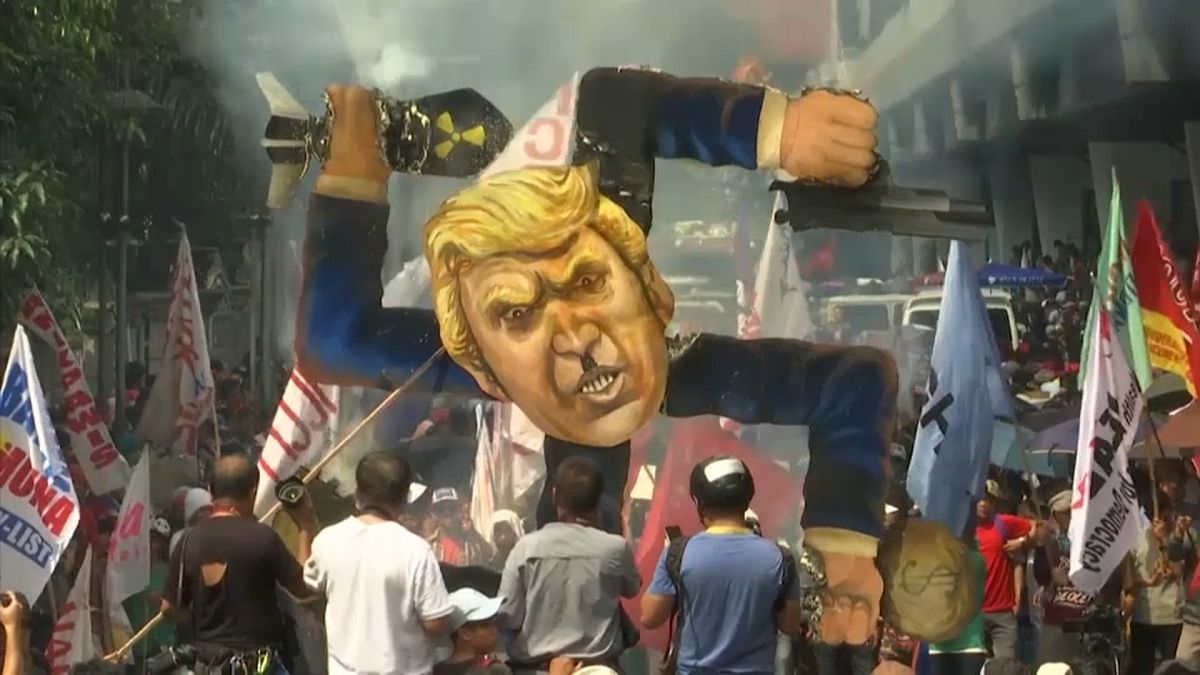 Swastika-shaped Trump effigy set on fire in Manila