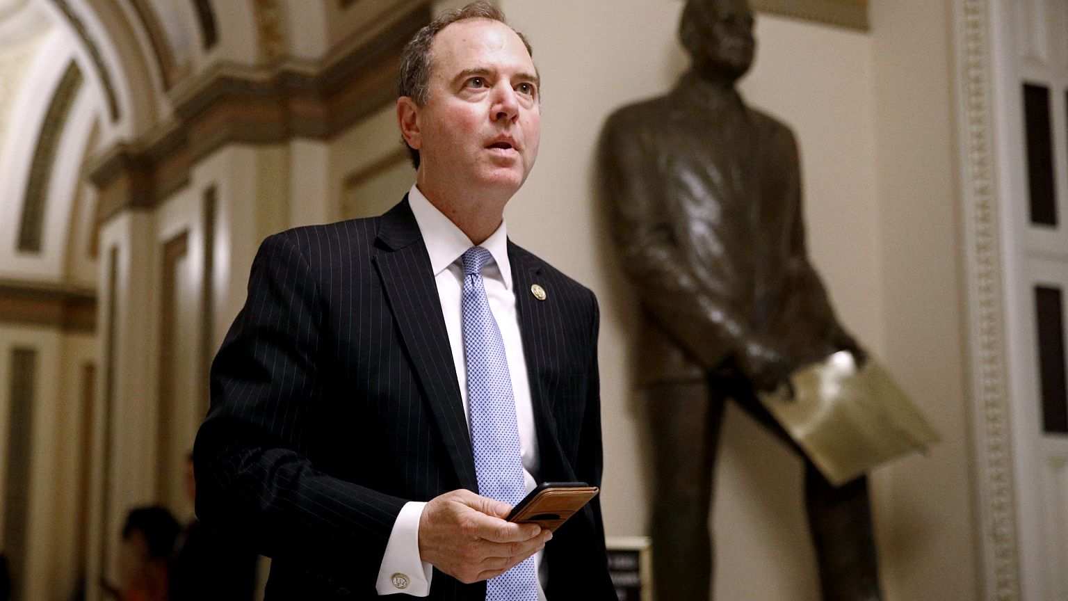 Image: Rep. Adam Schiff, D-Calif., walks out of the House Chamber on July 1