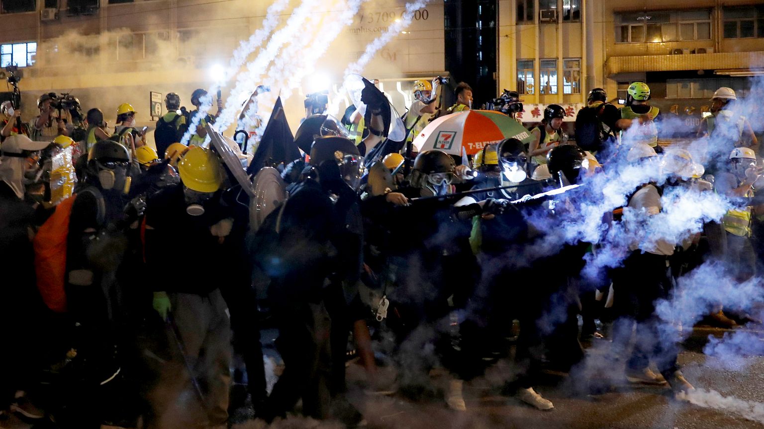Image: Demonstrators have tear gas fired at them by riot police in Hong Kon