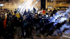 Image: Demonstrators have tear gas fired at them by riot police in Hong Kon