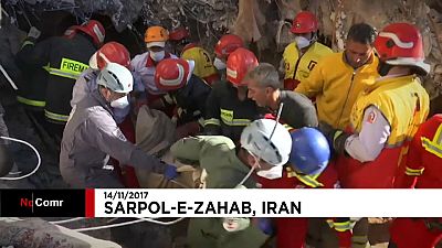 Rescuers sift through rubble after deadly Iran quake