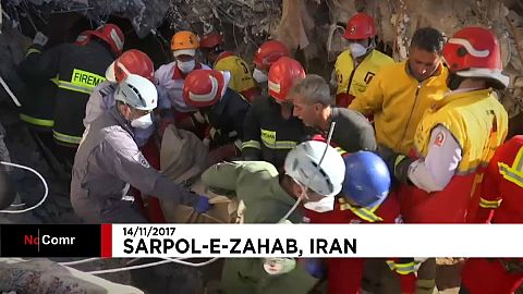 Rescuers sift through rubble after deadly Iran quake