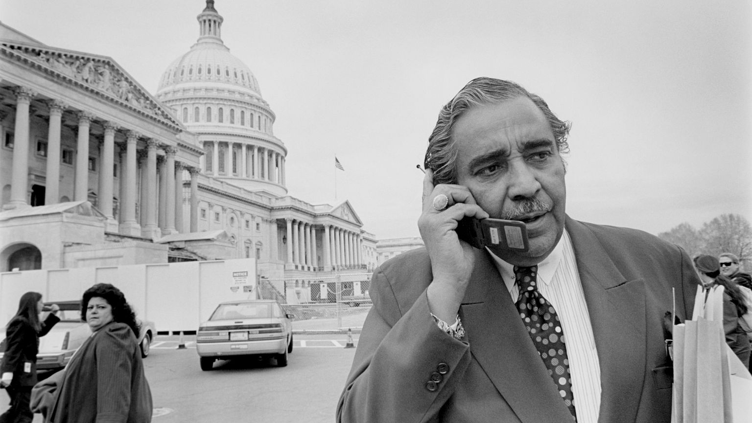 Image: Charles Rangel talking on mobile phone