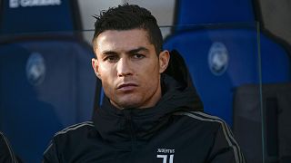 Cristiano Ronaldo looks on from the bench prior to a match on Dec. 26, 2018