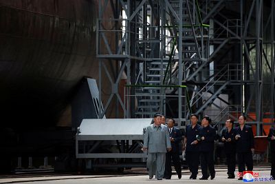 North Korean leader Kim Jong Un visits a submarine factory in an undisclosed location, North Korea, in this undated picture released by North Korea\'s Central News Agency on July 23, 2019.