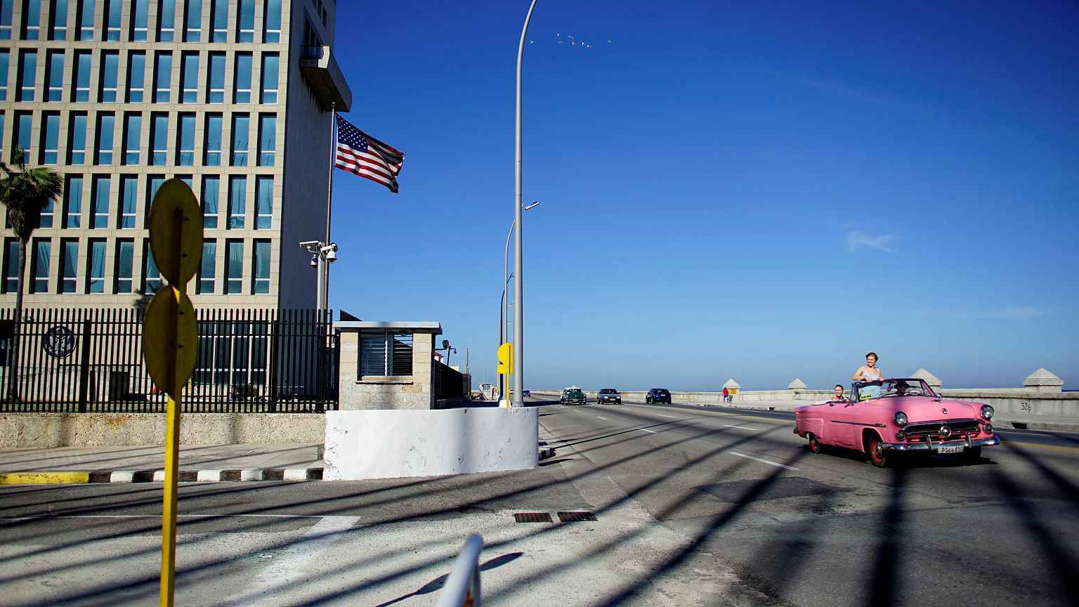 Tourists drive by the United States Embassy in Havana on Nov. 1, 2018.