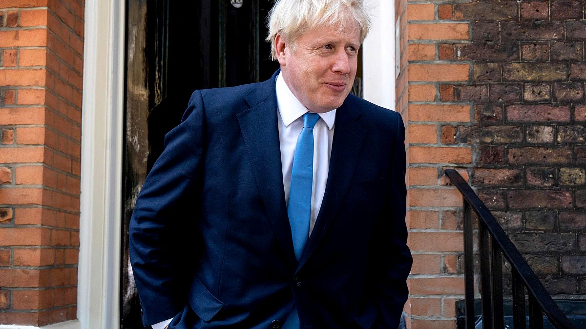 Image: Boris Johnson leaves his campaign headquarters in London on July 23,