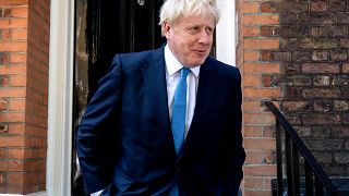 Image: Boris Johnson leaves his campaign headquarters in London on July 23,