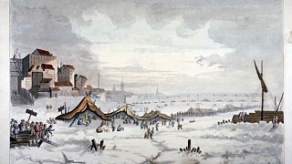 A painting of "frost fair" on the frozen River Thames in London in 1814 dur