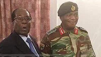 Mugabe meets army chief and 'peace' emissaries, standoff reported