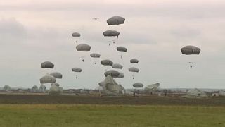 Serbian and U.S. army paratroopers jump together to strenghten ties