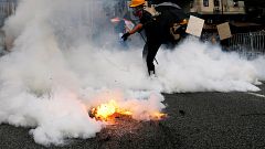 Demonstrators march to protest against in Yuen Long