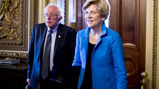 Image: Sen. Bernie Sanders, I-VT, and Sen. Elizabeth Warren, D-Mass., leave